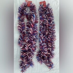 Two sets of 12’ red/white/blue garland